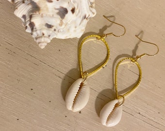Brass cowrie shell dangle earrings
