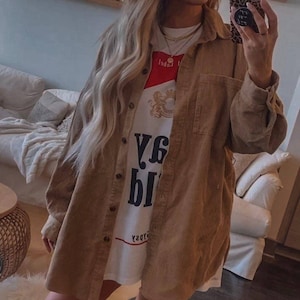 *BestSeller!!
You know the girls who always look like they're off to a music festival? These are the clothes they wear ✊ Our Stay Wild Concert Tee/Dresses are wider and oversized for the ultimate Stagecoach look!