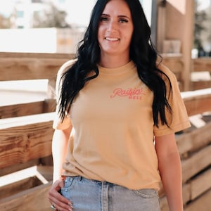 Raisin' Hell Graphic Tee: Bold Women's Style