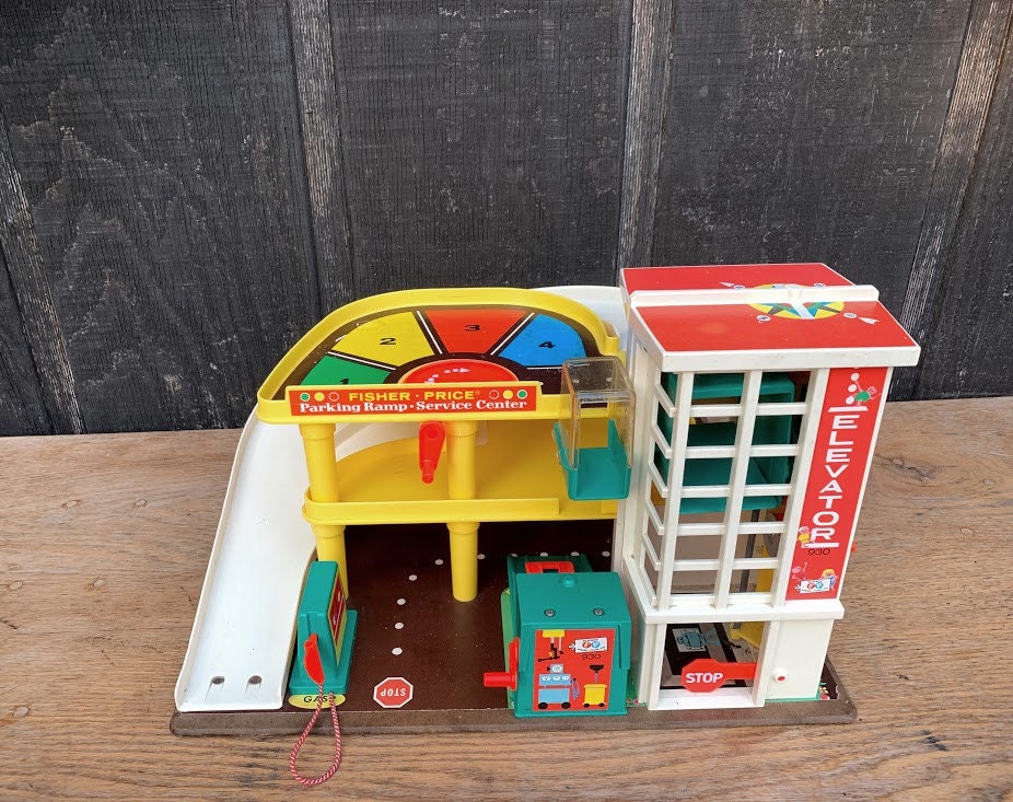 vintage fisher price parking ramp service center