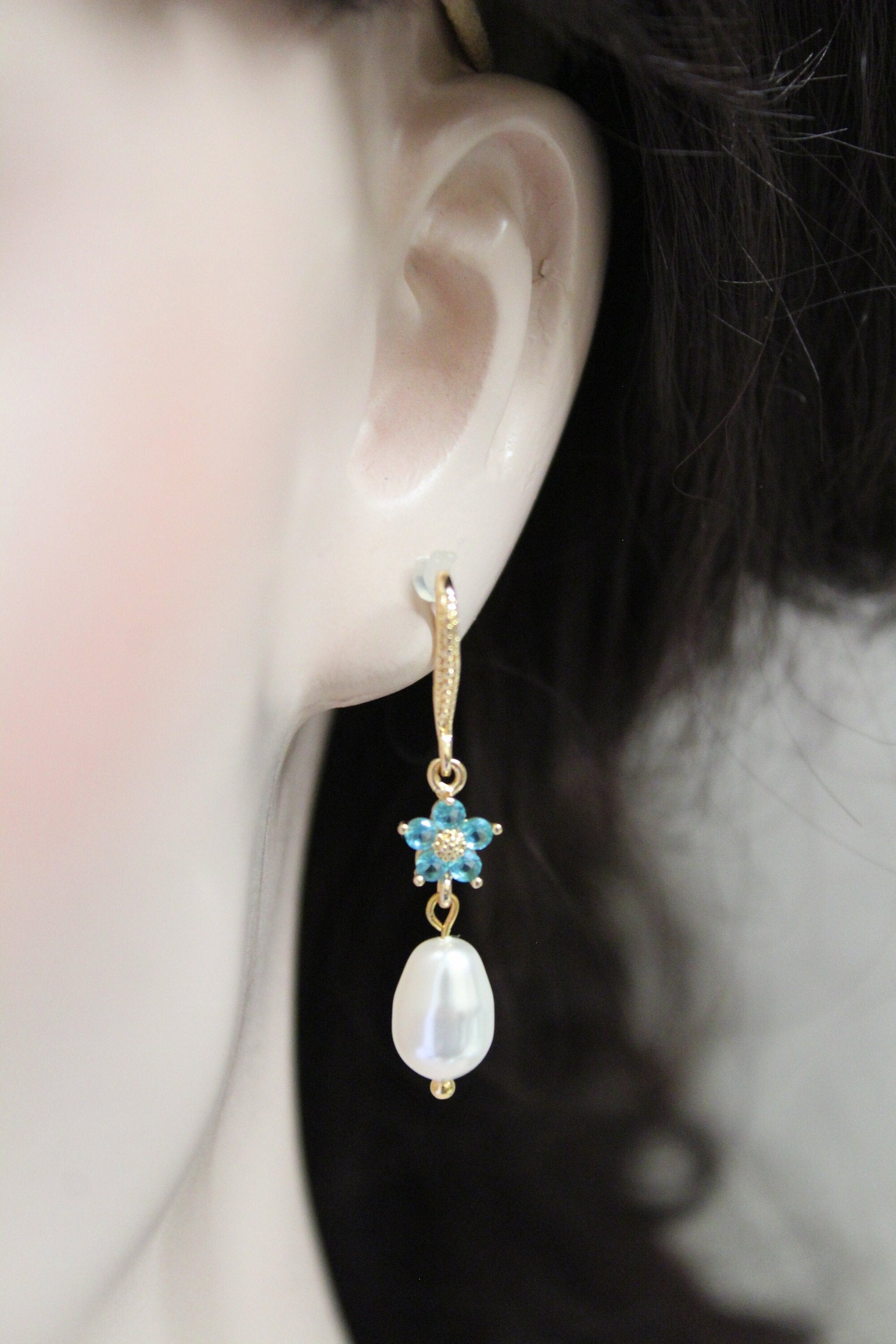 princess polly baby blue dress The Royal Family's Most Stunning Aquamarine Jewelry, From Queen Elizabeth  to Kate Middleton main image 0