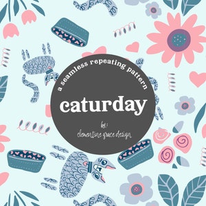 May include: A seamless repeating pattern featuring a light blue background with a gray cat, pink flowers, and blue bowls. The text "caturday" is in a circle with a gray background.