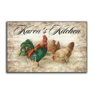 May include: A rustic wooden sign with the text "Karen's Kitchen" in black cursive lettering. The sign features a vintage illustration of a rooster and two hens.