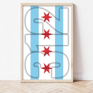 May include: A framed vertical print featuring the text CHI in large white block letters layered over a background of two light blue vertical stripes and a white center stripe, with four red six-pointed stars centered vertically.