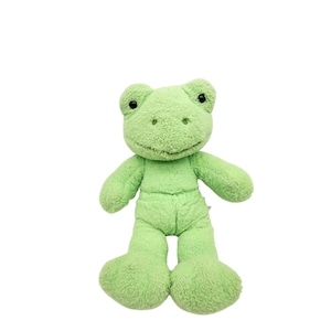 May include: A plush green frog toy with black eyes and a smiling expression. The frog has a soft, textured appearance and is wearing a matching green outfit. The toy is designed to be cuddly and is suitable for children.