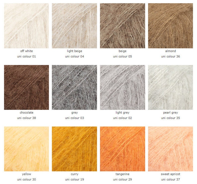 May include: A color chart of yarn samples in various shades of white, beige, brown, grey, yellow, and orange. The yarn is a soft, fuzzy mohair blend. Each sample is labeled with the color name and a corresponding uni color number.