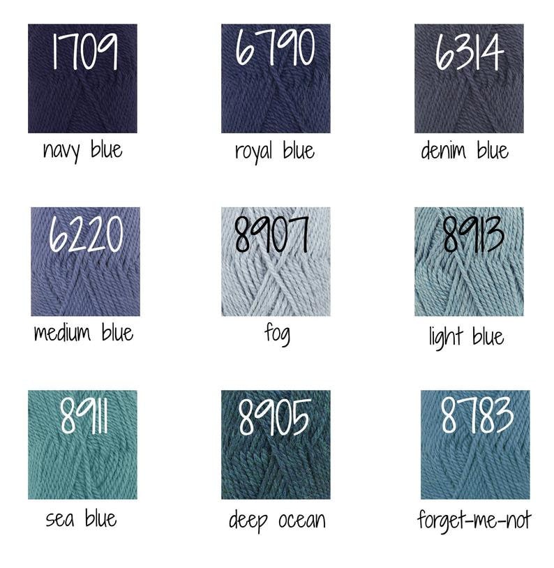 K&ouml;nnte beinhalten: Neun Kn&auml;uel Garn in verschiedenen Blaut&ouml;nen, darunter Marine, Royal, Denim, Mittelblau, Nebel, Hellblau, See, Tiefblau und Vergissmeinnicht. Jedes Kn&auml;uel hat eine Nummer aufgedruckt.