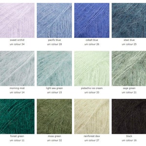 May include: A color chart of yarn samples in various shades of blue, green, and white. The yarn is a soft, fuzzy mohair blend. The colors are labeled with their names and corresponding uni color numbers.
