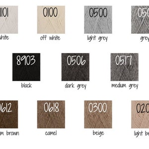 K&ouml;nnte beinhalten: Garnfarbenkarte mit 12 verschiedenen Garnfarben. Die Farben sind: Wei&szlig;, Creme, Hellgrau, Grau, Schwarz, Dunkelgrau, Mittelgrau, Mittelbraun, Camel, Beige und Hellbeige.