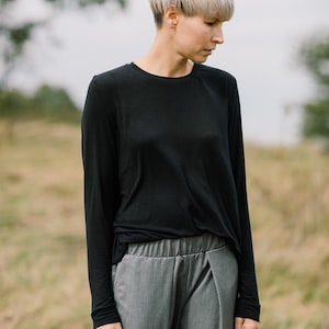 Maglia a maniche lunghe oversize morbida ed elegante minimalista in cashmere micromodal modal nero