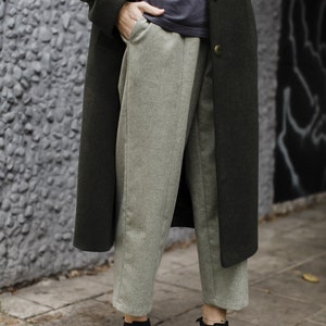 Minimalistic linear green woolen trousers LISBOA image 6