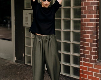 Minimalistic linear elegant khaki silk wool trousers HOF