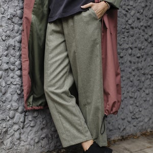 Minimalistic linear green woolen trousers LISBOA image 2