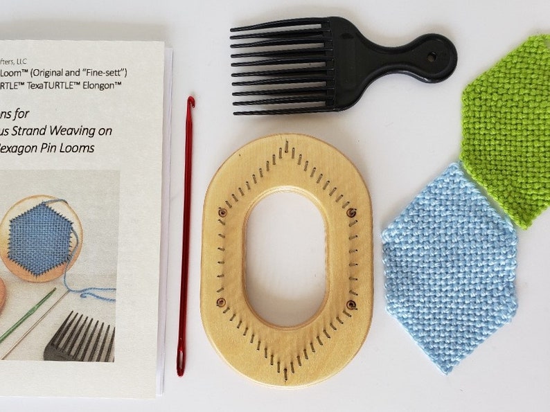 May include: A set of weaving tools including a wooden hexagon loom, a red crochet hook, a black comb, and two woven samples in green and blue.