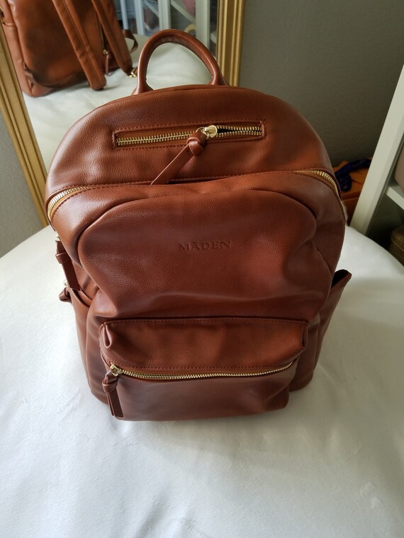 camel color backpack