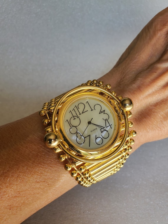 Chunky gold online watch womens