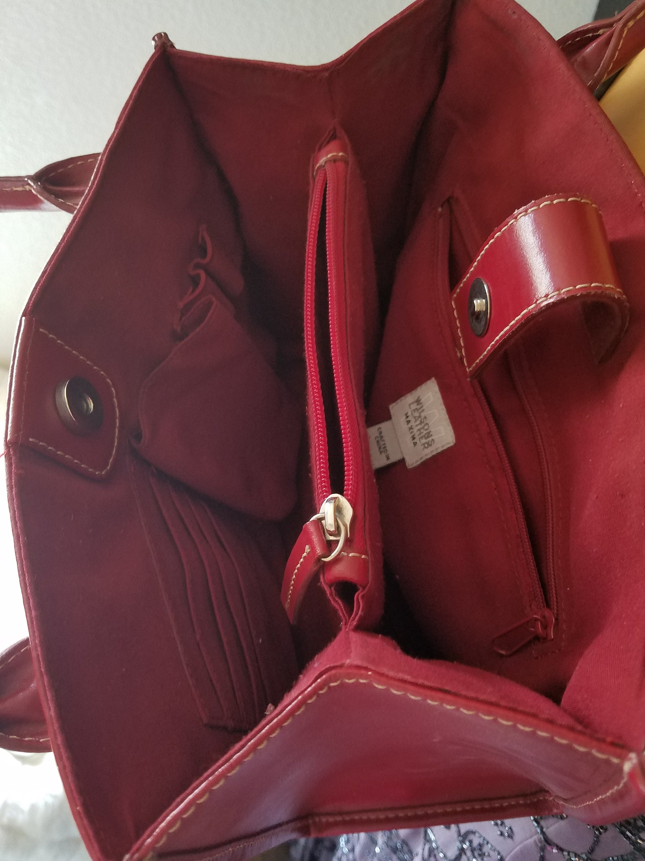 Wilsons leather maxima purse sale