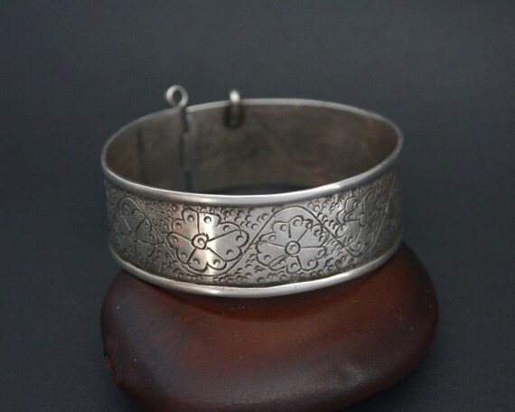 A rare parcel-gilt silver tripod vessel and cover Tang