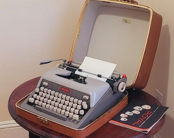 Typewriter Royal Futura 800 Grey 1960s Vintage with Case and Booklet Works Shipping Included