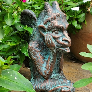 Gargoyle cast in cement with bronze finish garden statue