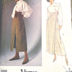 May include: A vintage Vogue Patterns Designer Original sewing pattern featuring an Issey Miyake design. The pattern includes a wrap skirt and a long-sleeved shirt. The pattern size is 6-8-10.