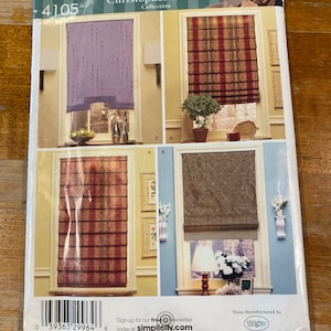 May include: Simplicity 4105 sewing pattern for Christopher Lowell Collection window treatments. The pattern features four different Roman shade designs in various colors and patterns. The package includes the Simplicity logo and the text "Sign-up for our free newsletter today at simplicity.com."