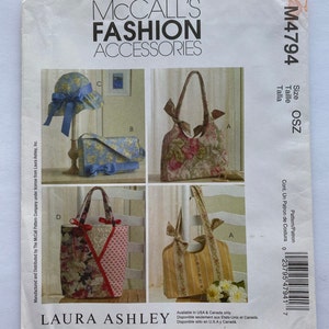 May include: A sewing pattern for four different bags, including a tote bag, a hobo bag, a satchel bag, and a hat. The pattern is from McCall's Fashion Accessories and is designed by Laura Ashley. The pattern number is M4794 and the size is OSZ.