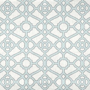May include: A seamless pattern featuring a light blue geometric design on a white background. The pattern is made up of repeating squares and circles.