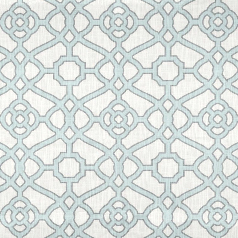May include: A seamless pattern featuring a light blue geometric design on a white background. The pattern is made up of repeating squares and circles.
