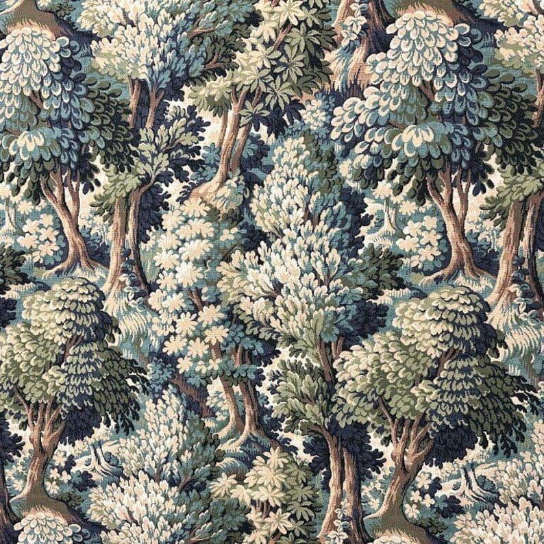 May include: A fabric with a detailed forest scene. The design features trees with green, blue, and cream-colored foliage and brown trunks. The pattern is dense, creating a textured, naturalistic look, suitable for home decor or apparel.
