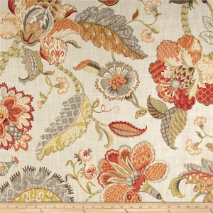 May include: A beige fabric with a floral pattern in shades of orange, red, and grey. The flowers are intricate and detailed, with a variety of shapes and sizes. The fabric is perfect for upholstery, curtains, or other home decor projects.