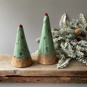 Christmas pottery Jingle Tree Set in antique green spruce patina finish with white slip trailed patterns on a warm speckled stoneware clay