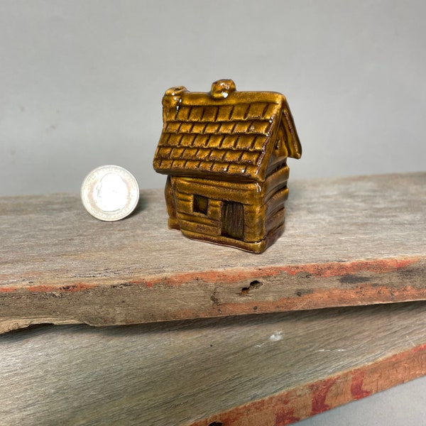 Miniature Primitive Log Cabin bottle, jug, crock in stoneware with iron glaze