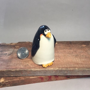Miniature, handmade, wheel thrown ceramic pottery stoneware penguin figurine
