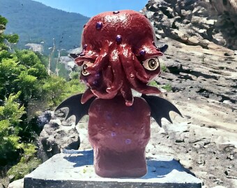 Red Cthulhu bobble head figurine with wings