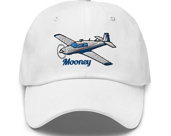May include: White baseball cap with an embroidered image of a Mooney aircraft and the word "Mooney" in blue.