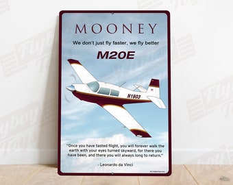 May include: A vintage-style metal sign featuring a white and maroon Mooney M20E aircraft in flight against a blue sky. The sign reads "MOONEY We don't just fly faster, we fly better M20E" and includes the quote "Once you have tasted flight, you will forever walk the earth with your eyes turned skyward, for there you have been, and there you will always long to return." - Leonardo da Vinci.