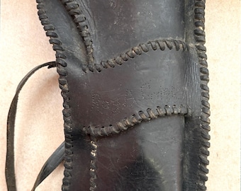 Vintage 1800's revolver holster user named