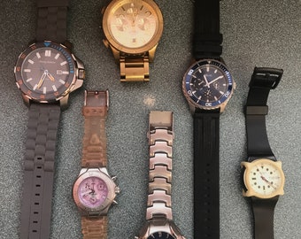 6 montres-bracelets à quartz d'occasion telles que trouvées