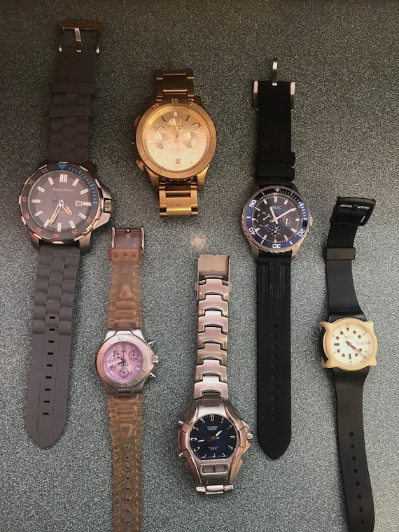 6 used quartz wristwatches as found