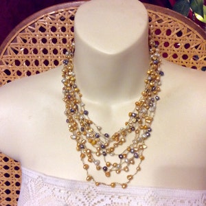 Vintage 1960&#39;s multi strand real gold black and white baroque pearl necklace.