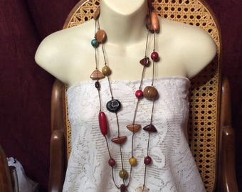 Single strand very long wood stone shell beads beaded necklace.