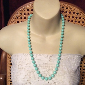 Light turquoise colored acrylic beads collar necklace. 1960s