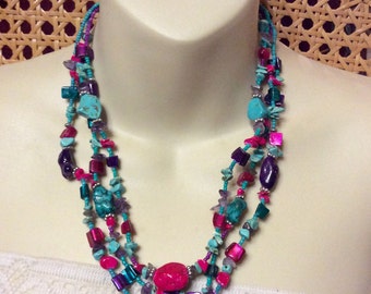 Real turquoise and glass gemstone multi strand tribal necklace .