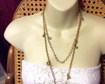 Vintage gold chain with swirl disc charms necklace.