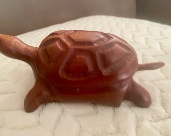 Hand carved baby land turtle from African Sapele wood