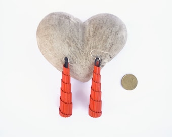 playful orange eco earrings of corrugated cardboard cone shaped