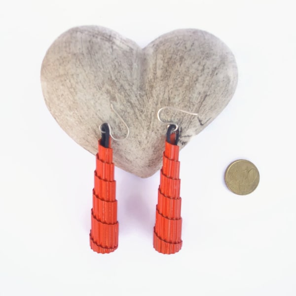 playful orange eco earrings of corrugated cardboard cone shaped