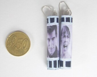 Earrings in black cardstock decorated with white acrylic shaped film (Psycho by Alfred Hitchcock)