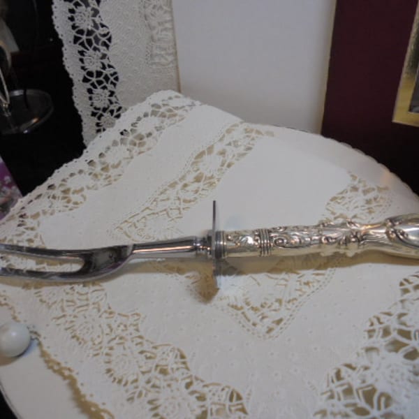 Sterling Silver "W" Sterling Meat Fork  marked Sterling handle 11 1/2 IN.